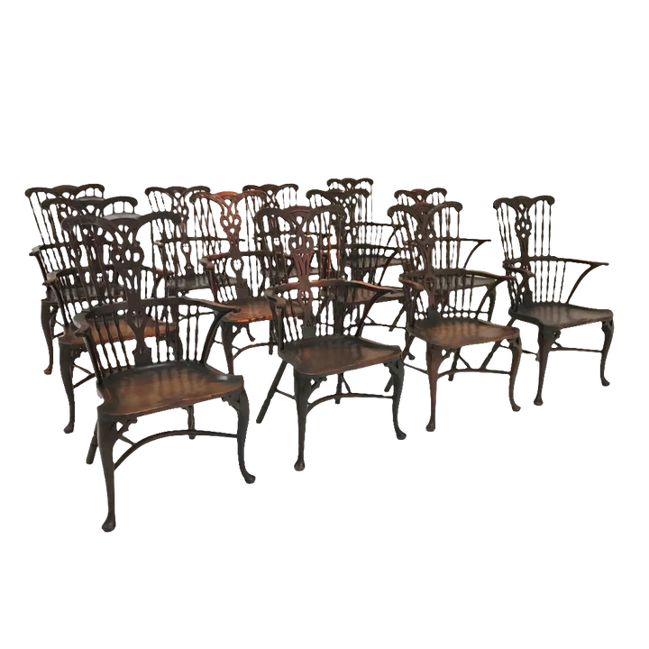 Set of 12 Georgian comb-back Windsor armchairs with elm seats and cabriole legs by Nwtiques.
