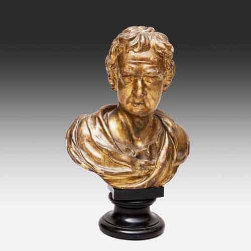 Carved giltwood bust of Isaac Newton on black pedestal base by The Sold Archive, gilding with areas of wear and white gesso visible