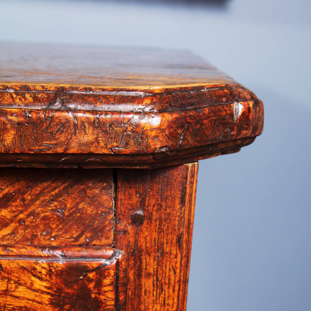 Close-up of highly figured elm corner on a 1750 Welsh dresser base from Collection CK20 showcasing rich patina and craftsmanship