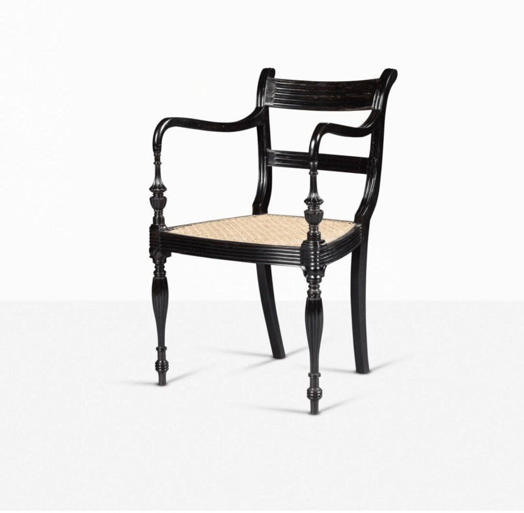 Anglo-Ceylonese ebony open armchair with cane seat, elegant design by The Sold Archive, circa 2000 from Sri Lanka.