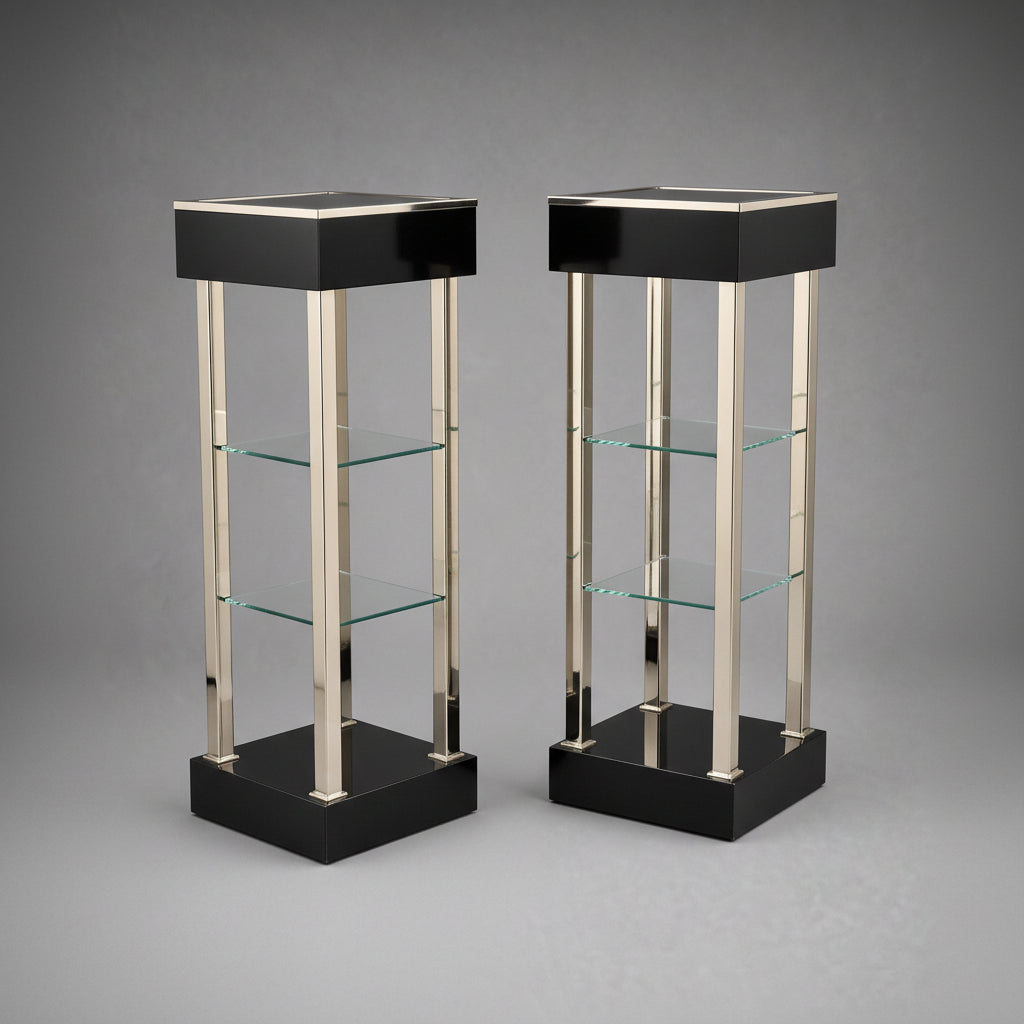 A pair of mid century Belgochrom glass and chrome etageres pedestals