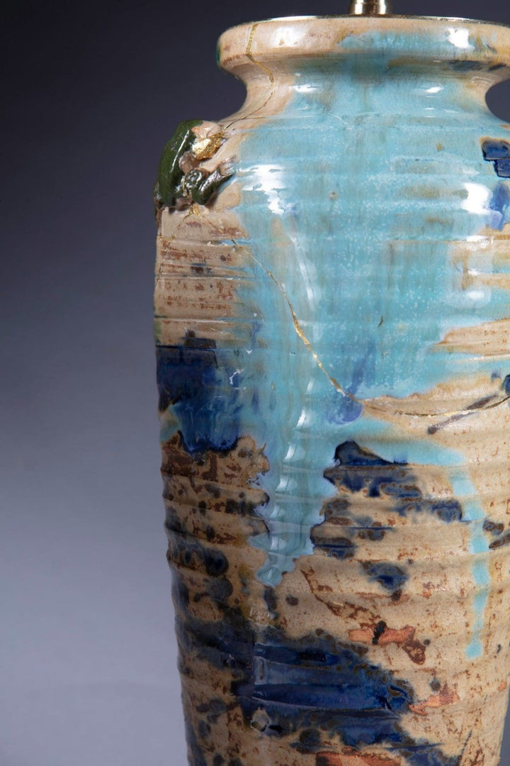 Close-up of late Edo Japanese ceramic vase with blue glaze, gold kintsugi repair, and frog motif by Collection TH20
