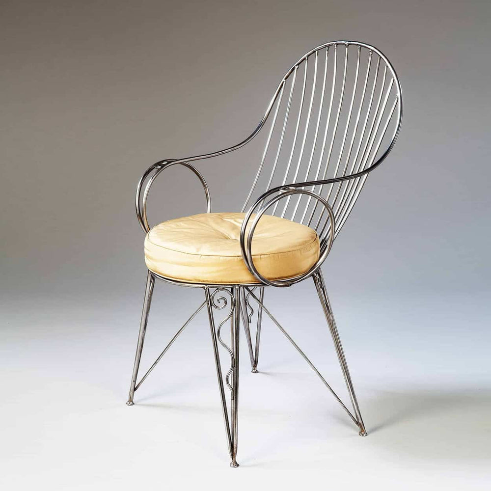 Modernist Steel Desk Chair with serpentine motifs and leather cushion by Collection TH20, mid-century English design.