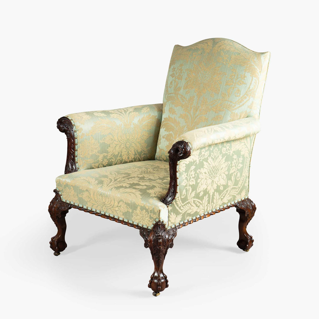Elegant 19th Century English library chair with carved mahogany frame and floral damask upholstery by Collection CK20