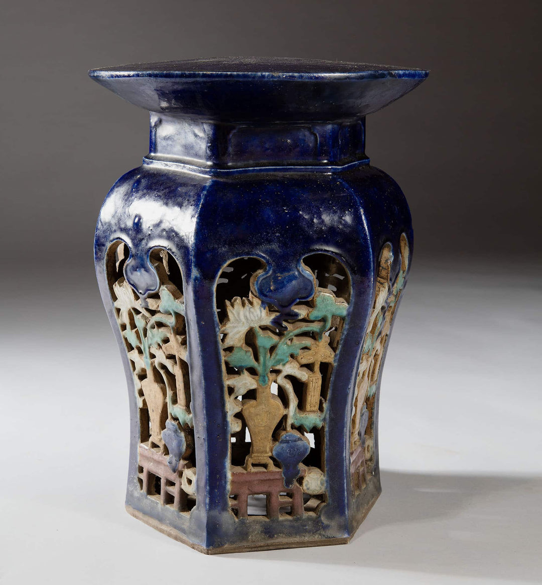 Pair of blue glazed Chinese pottery garden seats with carved floral designs from Collection EE30