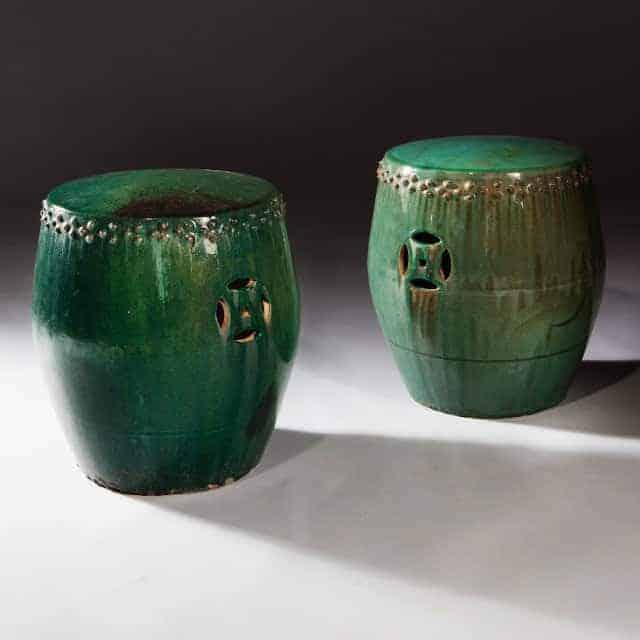 Pair of green glazed Chinese pottery stools with pierced geometric designs by The Sold Archive, height 16.5 inches