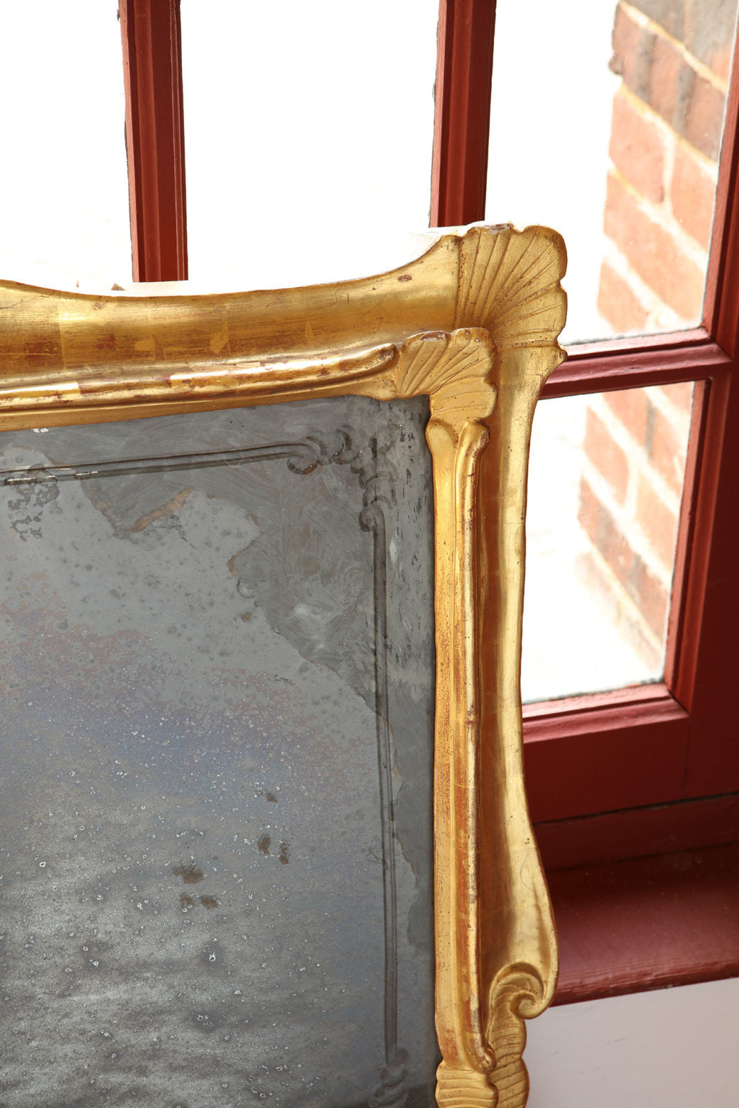 Pair of Venetian mid 18th Century wall mirrors with original engraved plates and giltwood frames, circa 1750 Venice.