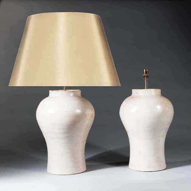 Pair of antique white pottery baluster table lamps with beige shade by The Sold Archive