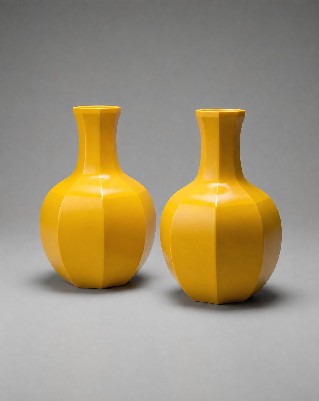 Pair of Faceted Yellow Glass Vases