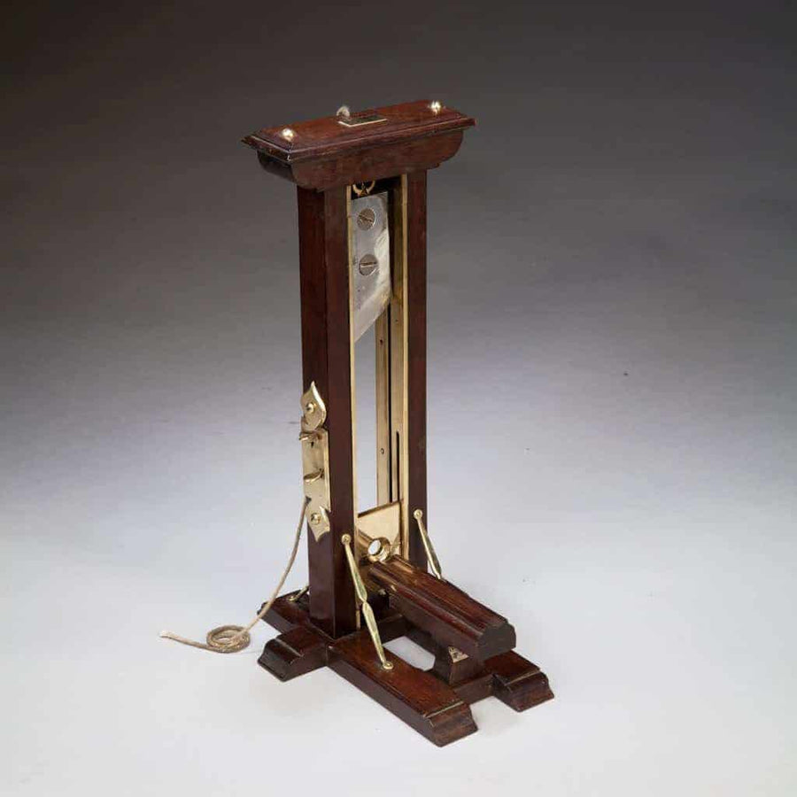 Antique 1880 mahogany and brass guillotine cigar cutter from The Sold Archive, inspired by Ile du Diable prison design.