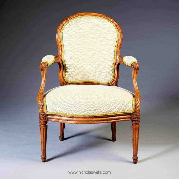18th century Louis XV transitional fauteuil by NS Courtois, elegant design sold by Nwtiques