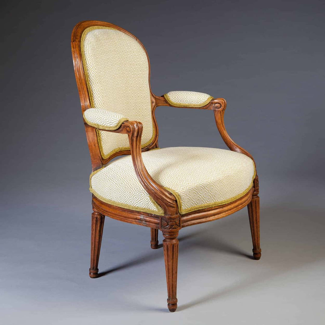 18th century Louis XV Transitional fauteuil by Nicolas Simon Courtois offered by Nwtiques