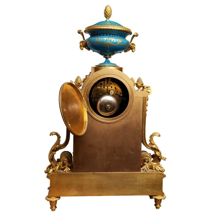 Late 19th-century Napoleon III Sevres and ormolu clock with krater vase, Nwtiques.