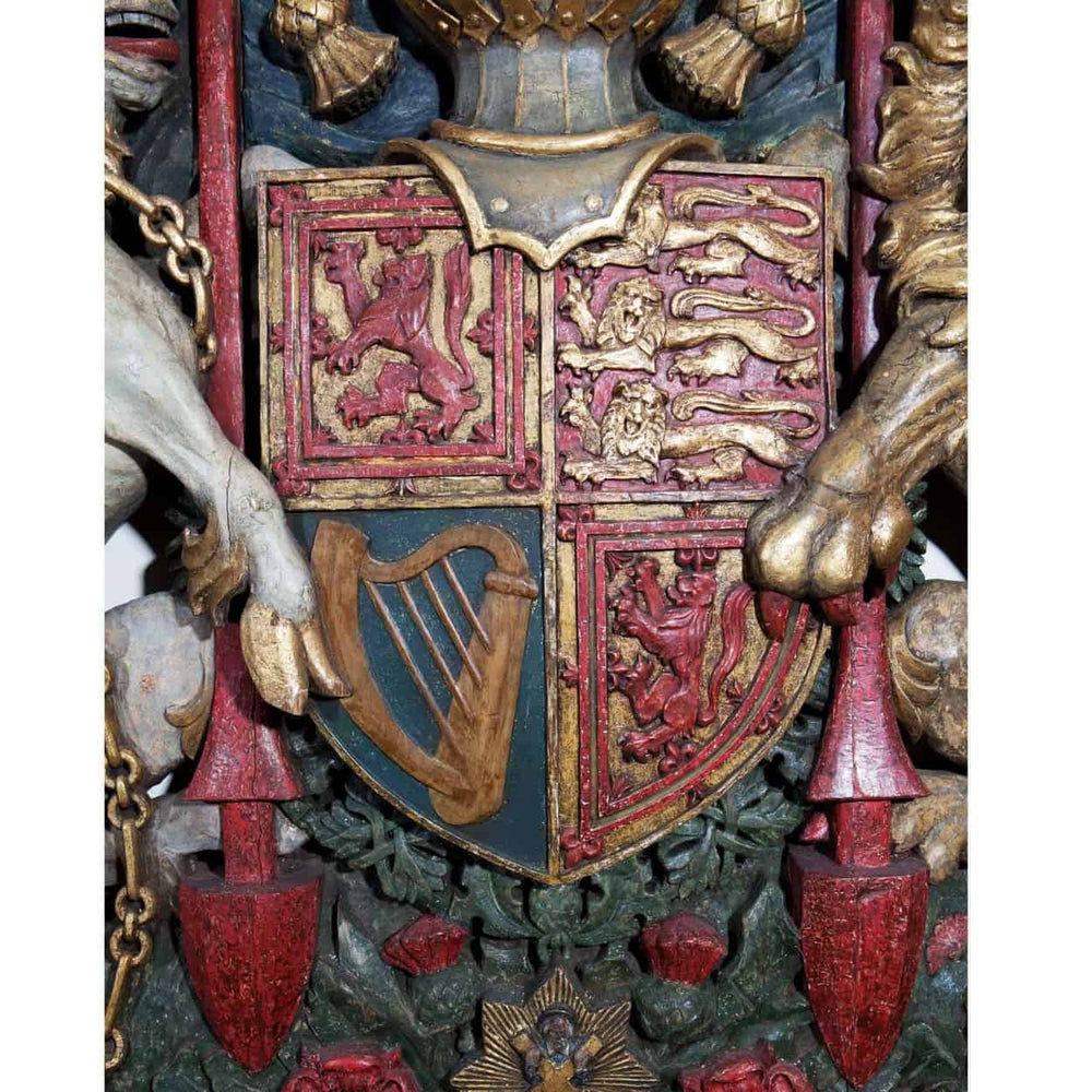 Close-up of a 19th Century Royal Coat Of Arms sculpture by Collection CK10 showcasing detailed heraldic shield and figures
