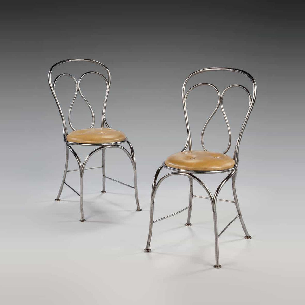 Pair of tubular steel chairs with leather seats in the manner of Thonet from Collection TH20, elegant modernist design.