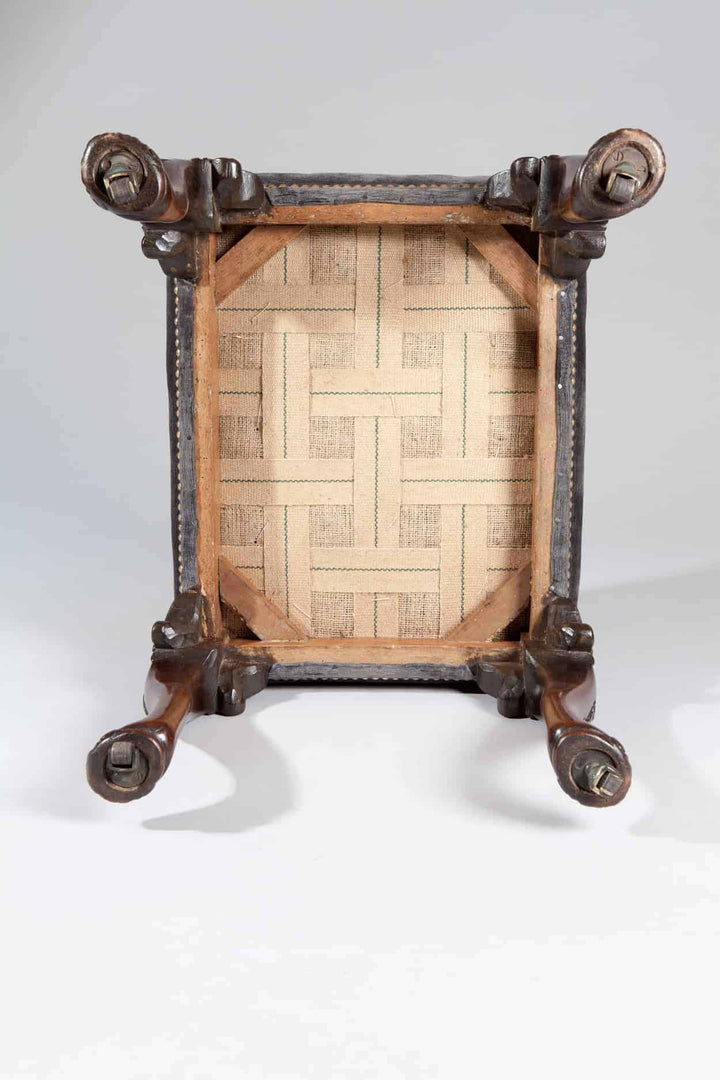 Underside view of early 18th century George II walnut stool with exquisite needlepoint upholstery by Collection CK20