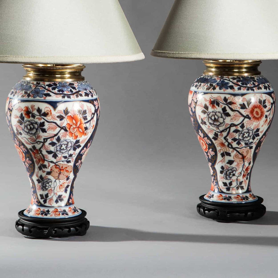 Pair of Bayeux Veuve Langlois Imari porcelain lamps with floral design on wooden bases by The Sold Archive