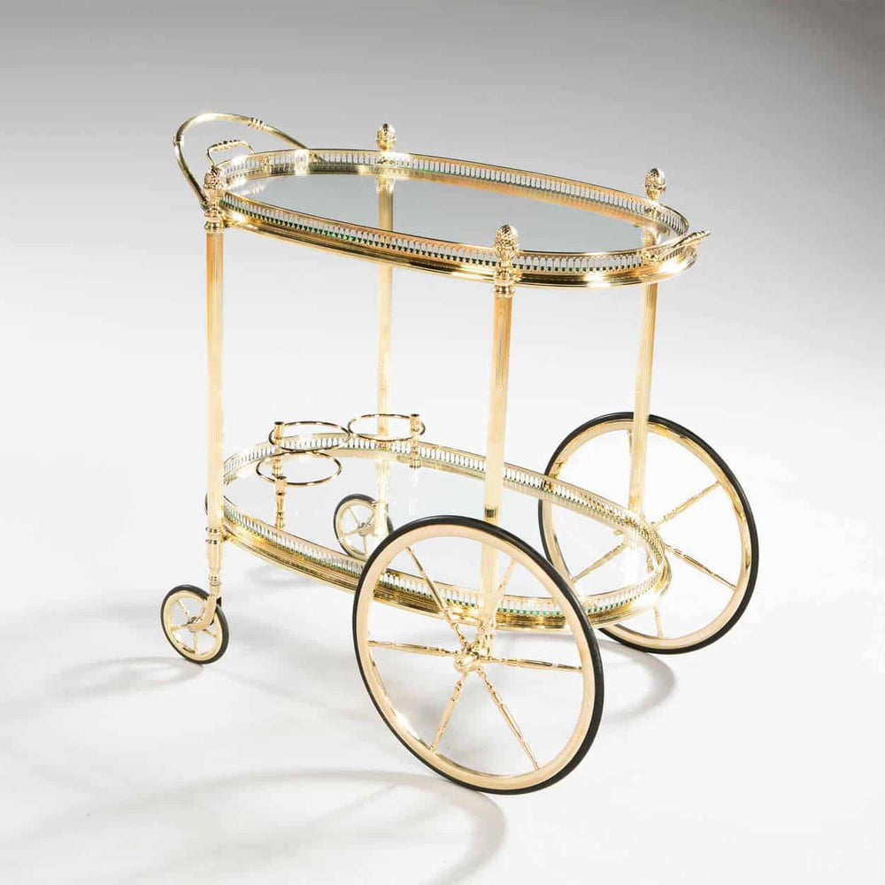 Mid Century Maison Jansen bar cart drinks trolley with gold frame and glass shelves by Nicholas Wells Antiques
