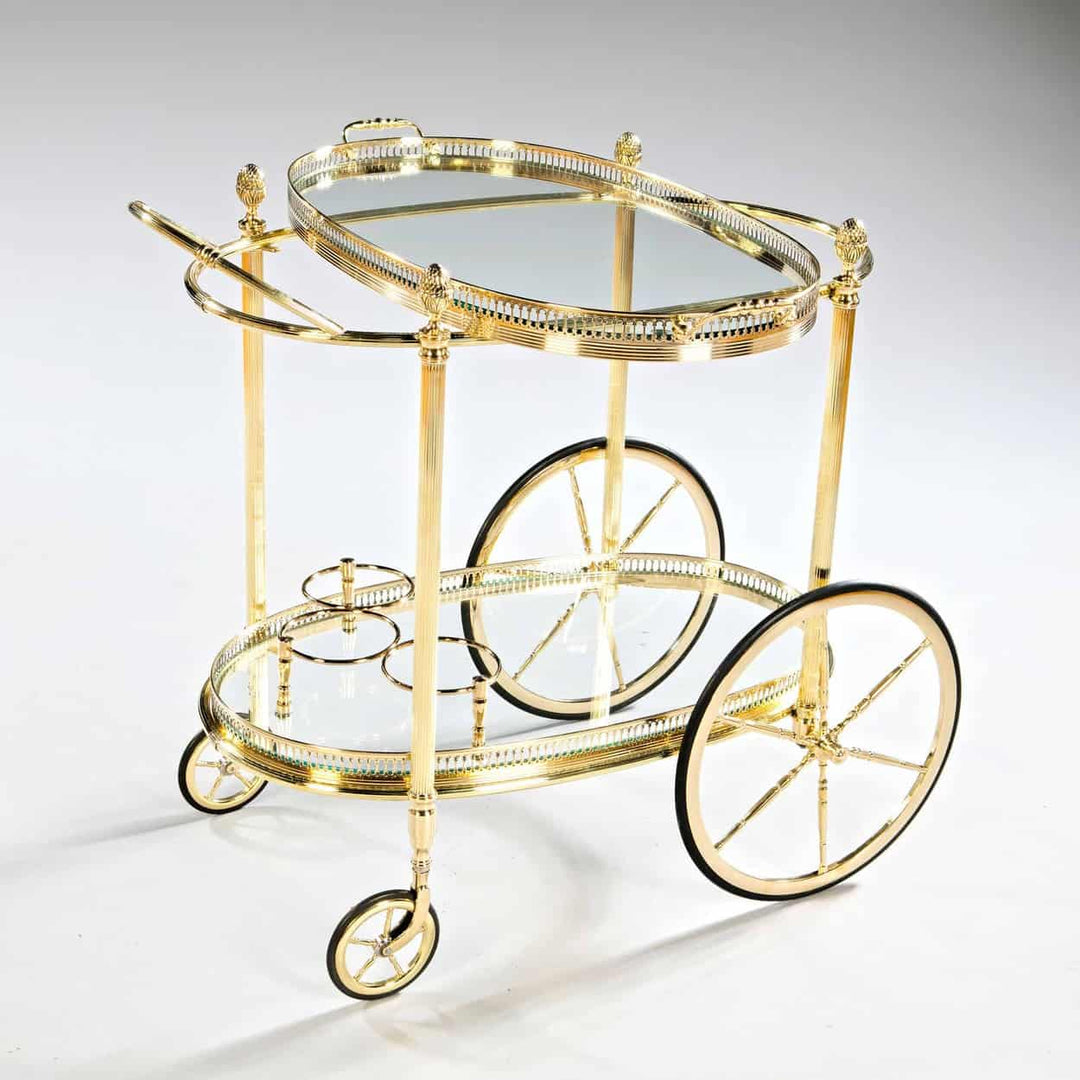 Mid century Maison Jansen bar cart drinks trolley by Nicholas Wells Antiques with polished brass and glass shelves