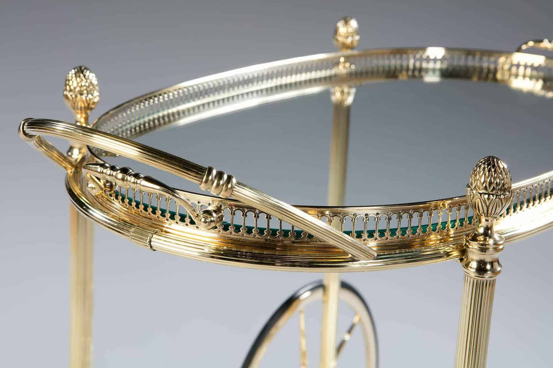 Close-up of a luxurious mid-century Maison Jansen bar cart handle by Nicholas Wells Antiques with gold detailing