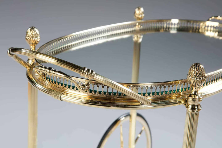 Close-up of a luxurious mid-century Maison Jansen bar cart handle by Nicholas Wells Antiques with gold detailing
