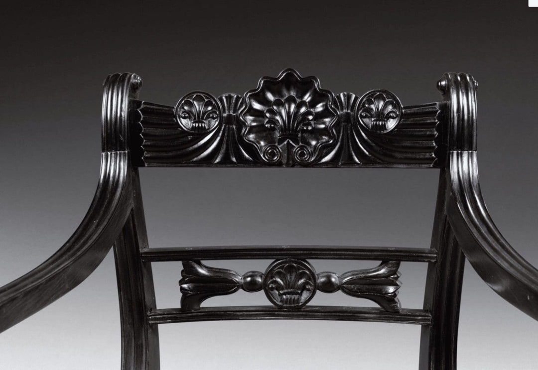 Close-up of carved ebony armchair backrest with floral motifs from Collection EE30 set of six antique chairs