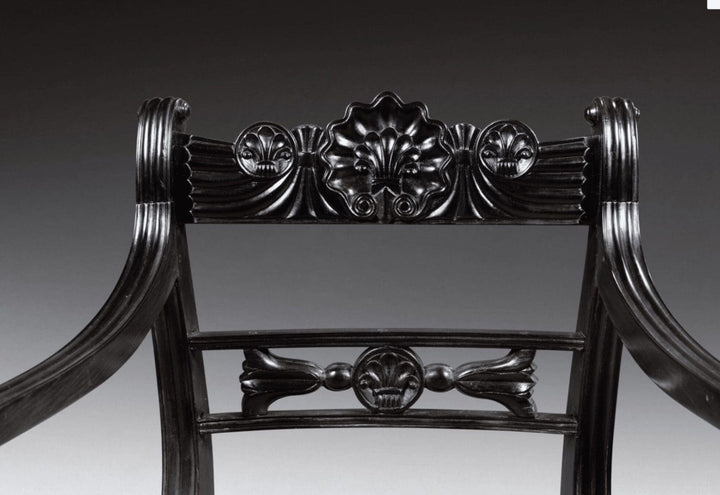 Close-up of carved ebony armchair backrest with floral motifs from Collection EE30 set of six antique chairs