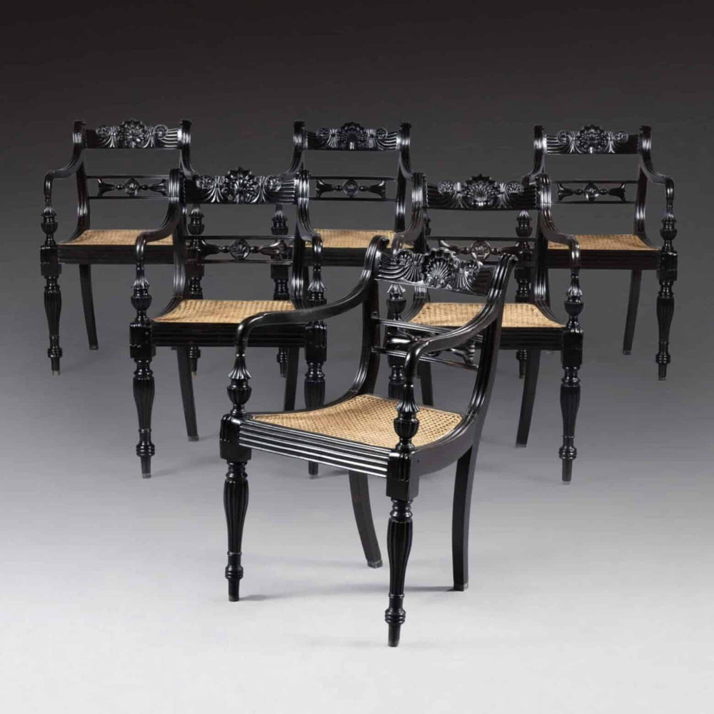 Set of six Anglo-Indian Ceylonese ebony armchairs with cane seats, ornate carving, by Collection EE30