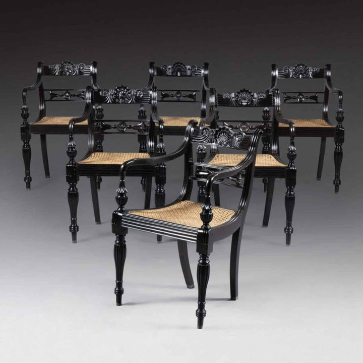 Set of six Anglo-Indian Ceylonese ebony armchairs with cane seats, ornate carving, by Collection EE30