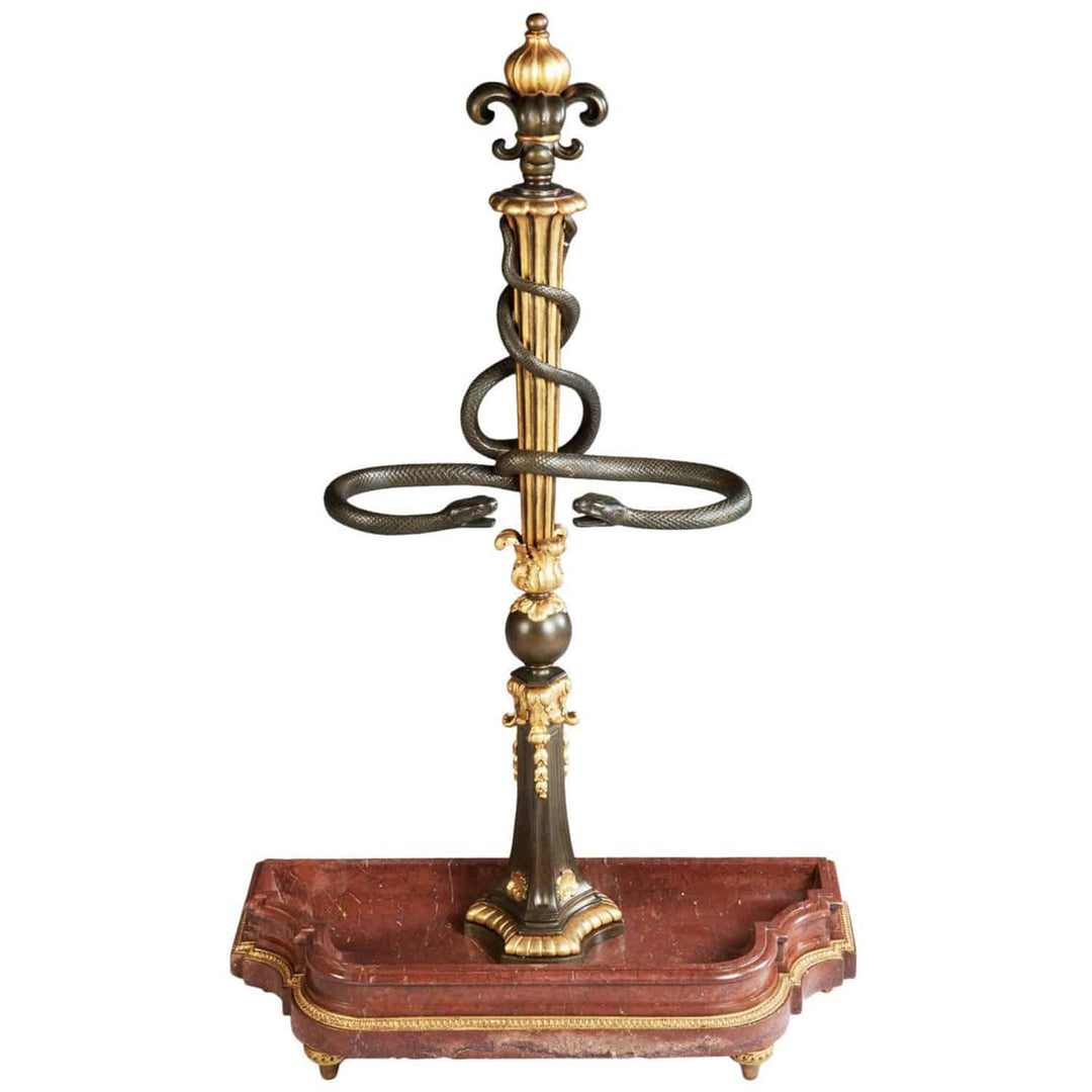 Antique parcel gilt bronze umbrella stand with entwined snakes on red marble base by The Sold Archive