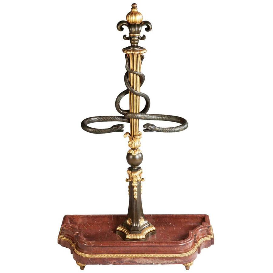 Antique parcel gilt bronze umbrella stand with entwined snakes on red marble base by The Sold Archive