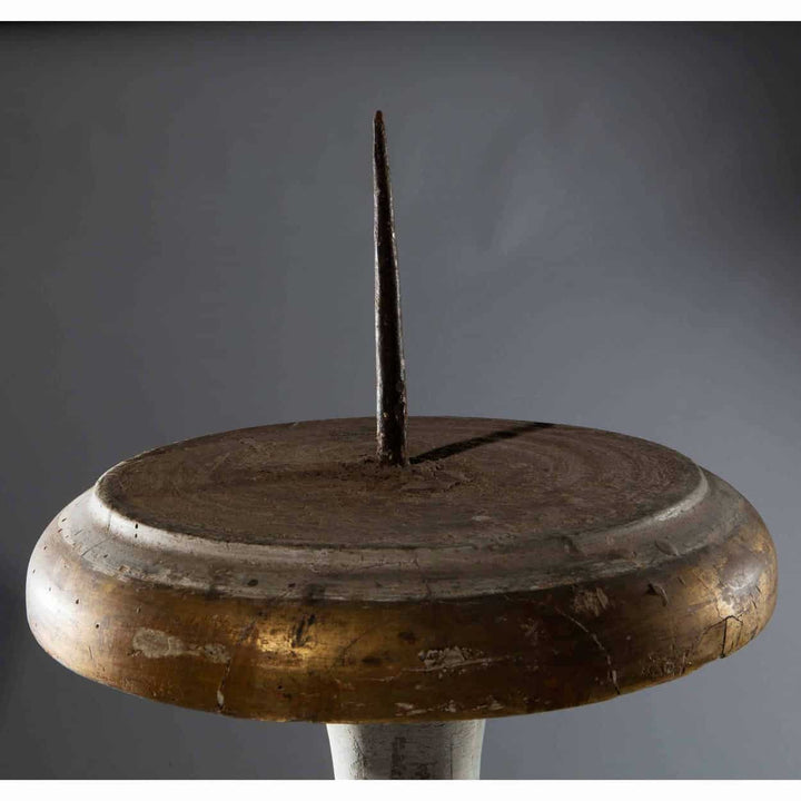 Close-up of a white and gold 18th century North Italian torchere with an iron spike from Collection EE10