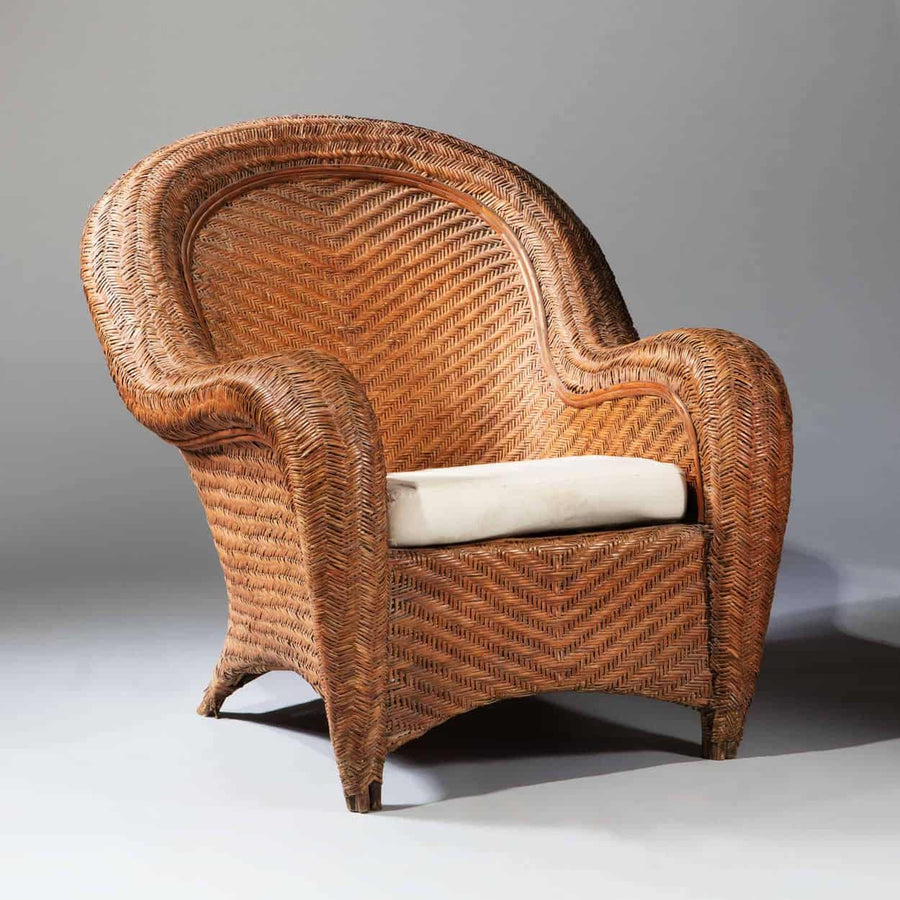 Large scale French wicker armchair with balloon back and cushion by The Sold Archive, circa 1900, elegant and spacious design